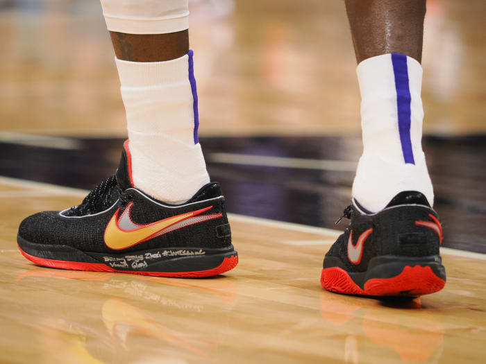 Black and red Nike LeBron shoes.